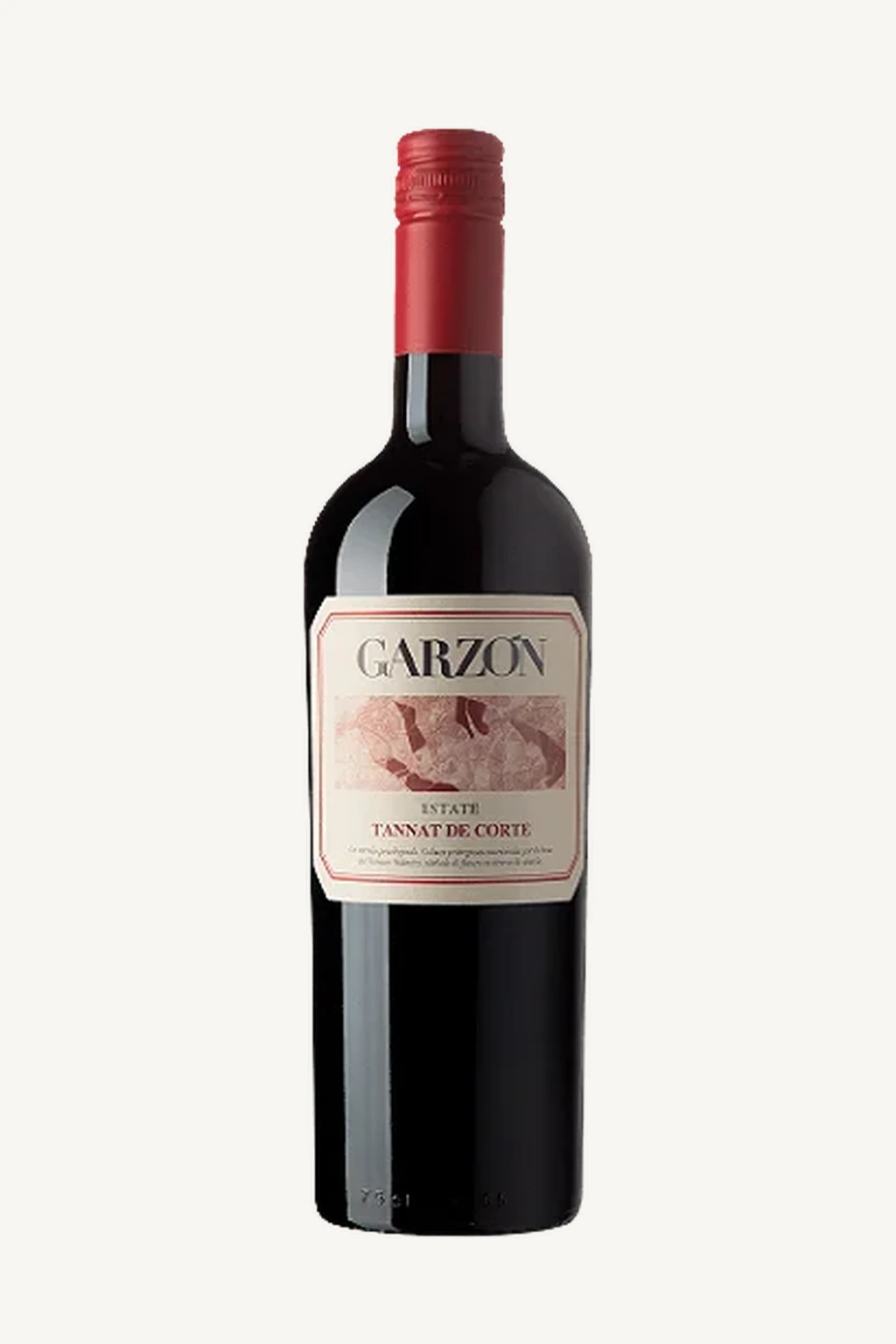 Uma garrafa de vinho tinto Bodega Garzón Estate Tannat de Corte com rótulo branco e cápsula vermelha.
