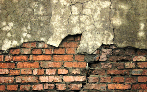 destroyed brick wall