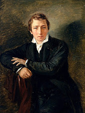 Heinrich Heine: Retrato em pintura de um homem jovem com casaco escuro e colarinho branco, identificado como o poeta Heinrich Heine.