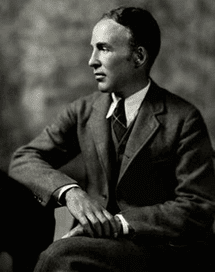 António Botto: Retrato vintage em preto e branco de um homem de perfil usando paletó e gravata.