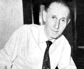 João Pereira Venâncio: Retrato em preto e branco de um homem idoso vestindo camisa clara e gravata escura.