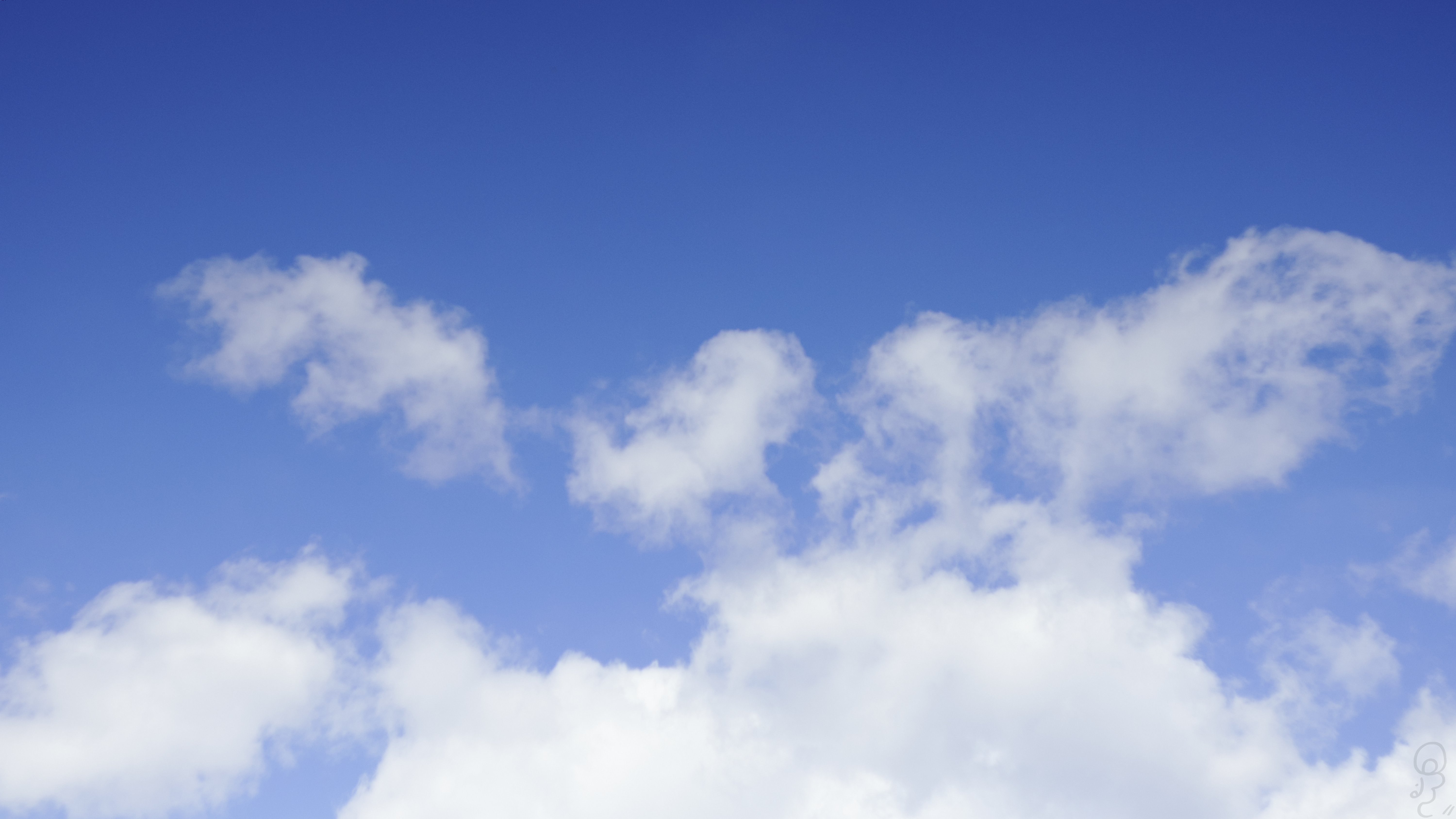 An image of A picture of a partly cloudy sky