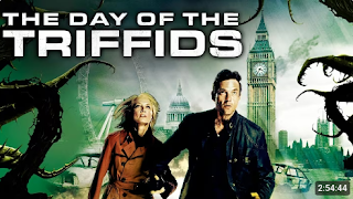 Dougray Scott, Joely Richardson: Banner promocional para a minissérie de ficção científica 'The Day of the Triffids', mostrando os protagonistas em frente a pontos turísticos de Londres em ruínas e cercados por plantas alienígenas.