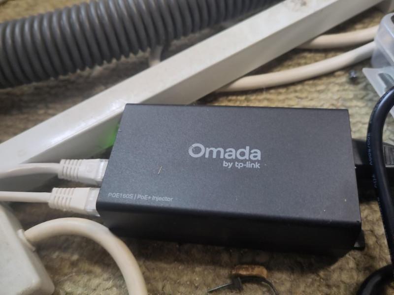 Photo of a TP-Link Omada POE injector