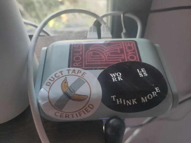 A photo of my travel router, it's a little 2 aerial thing