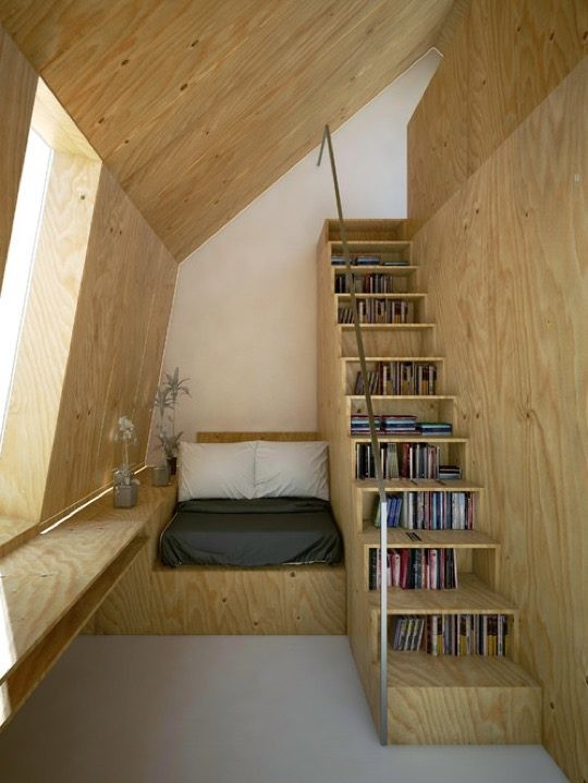 Scandinavian-stairway-library-and-reading-nook-540